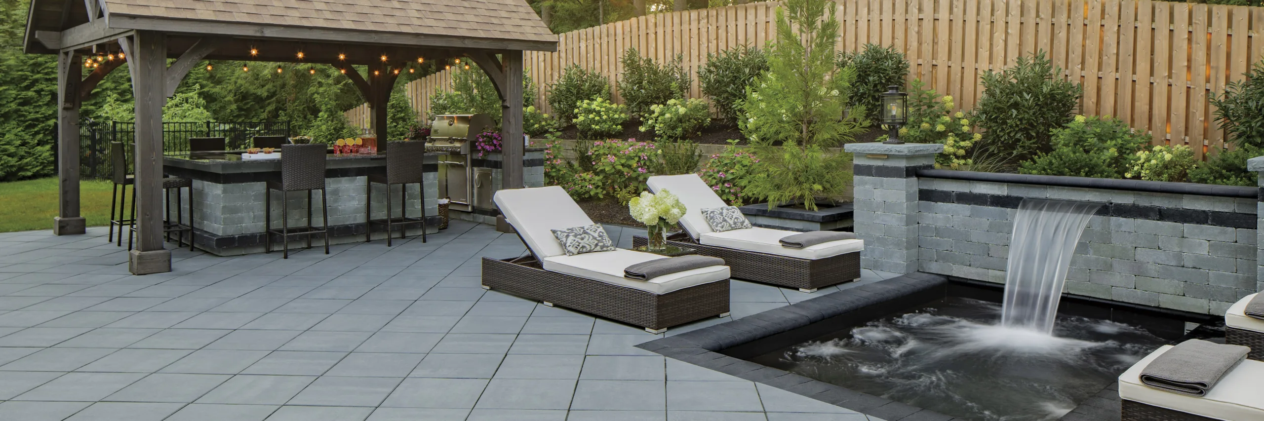 Transforming Outdoor Living with Hardscapes: Why Williams Trusts Delgado Stone, Cambridge Pavers, and Trex Decking